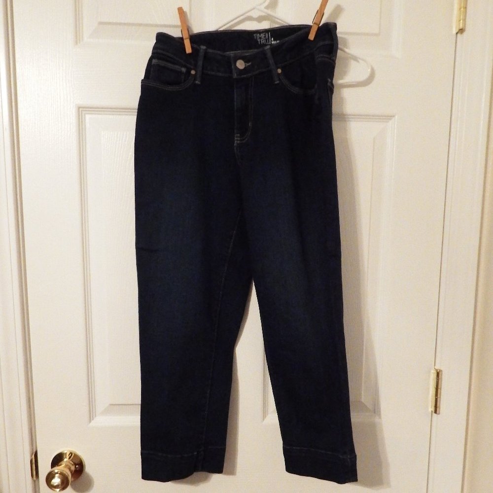 Blue jeans, mid rise, size 4.